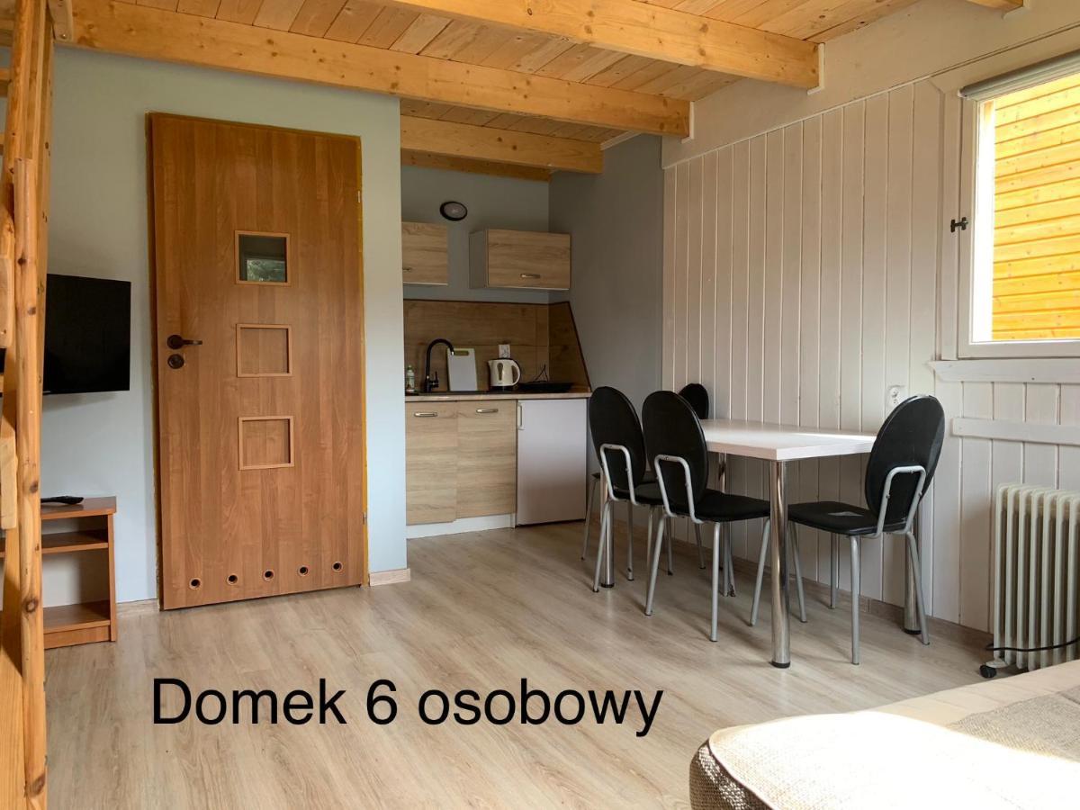 Domki Pod Lasem Mrzeżyno Esterno foto
